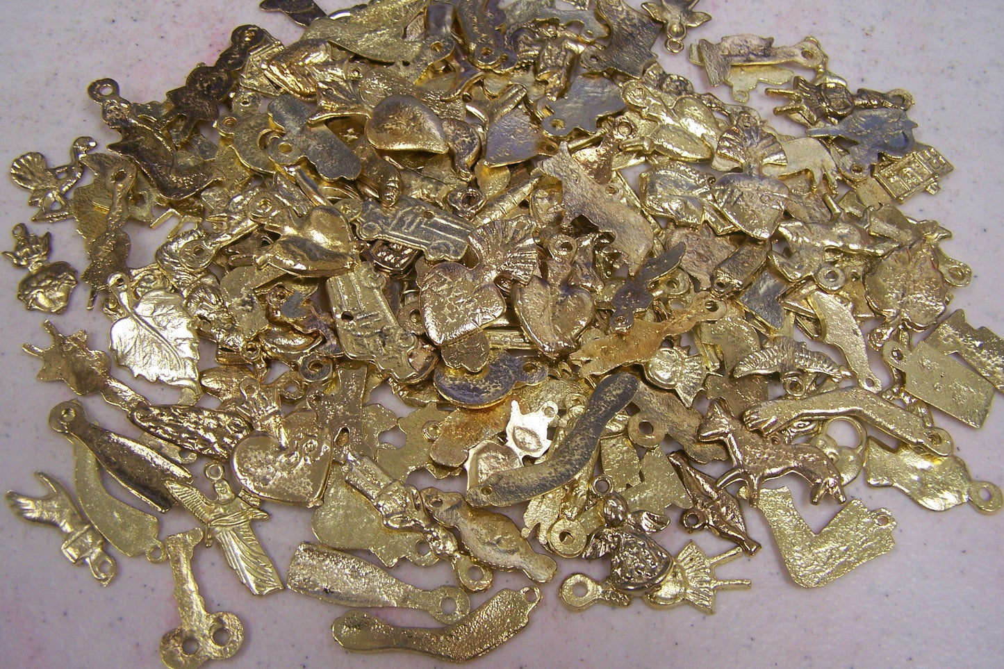 Lot of 50 Assorted Shiny Golden-Colored Milagros, Mexico