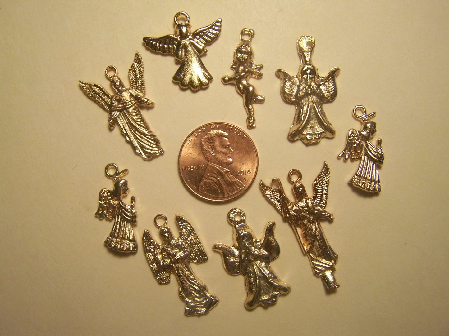 Lot of 50 ALL ANGELS Golden-Colored Milagros